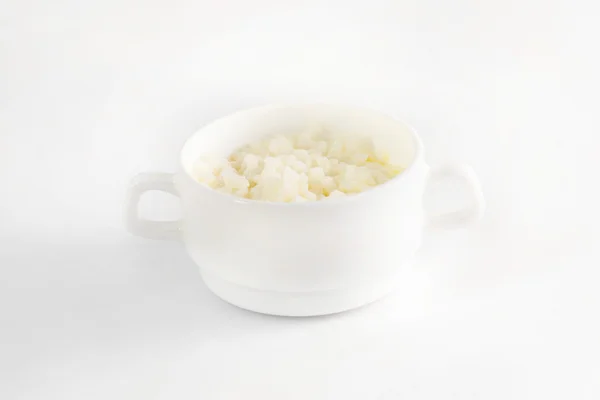 Bowl of fresh tasty rice porridge with piece of butter isolated at white background. — Stock Image Bowl of fresh tasty rice porridge with piece of butter isolated at white background. Royalty Free Stock Images