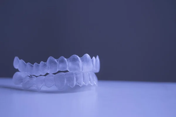 Invisible dental teeth brackets tooth plastic braces — Stock Photo, Image