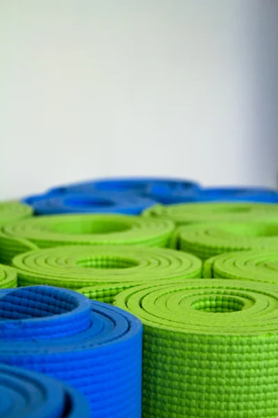 Rolled-up yoga mats — Stock Photo, Image