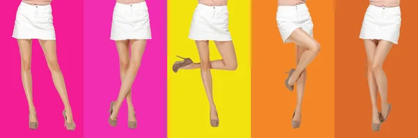 Shapely benen van jonge vrouw in stijlvolle jurk schoenen op levendige kleuren achtergrond. — Stockfoto