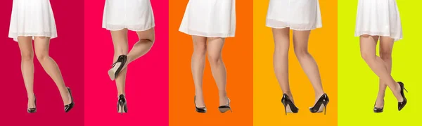 Shapely legs of young woman in stylish dress shoes on vibrant colors background. — Stock Photo, Image