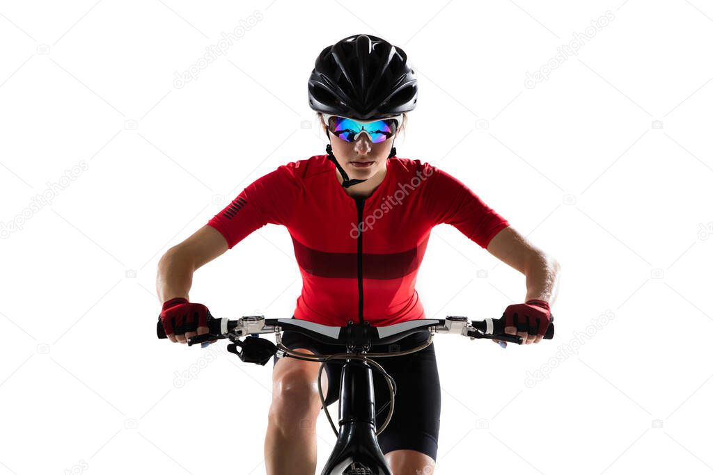 Closeup professional female cyclist with road bike isolated on white background.
