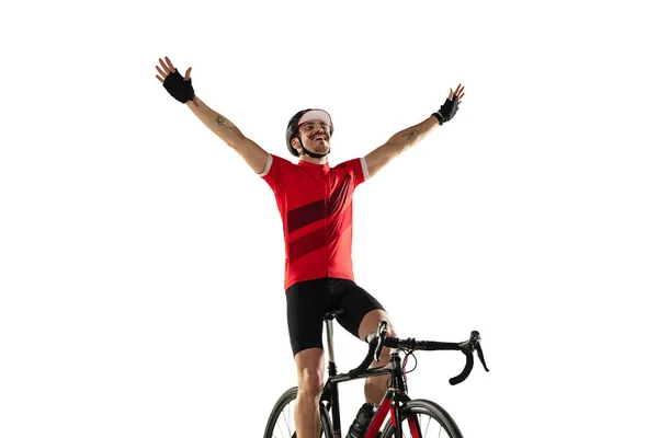 Professional male bike rider on road bike isolated over white background. — Stock Photo, Image