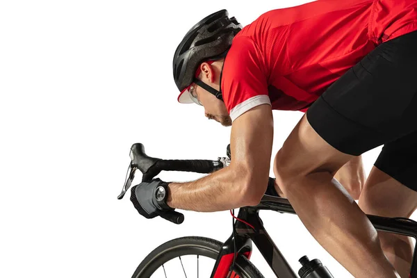 Joven ciclista masculino profesional en bicicleta de carretera aislado sobre fondo blanco. — Foto de Stock