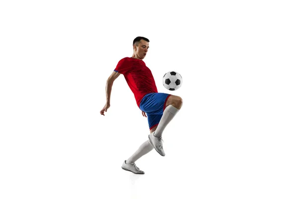 Young Caucasian soccer football player training isolated on white background. — Stock Photo, Image