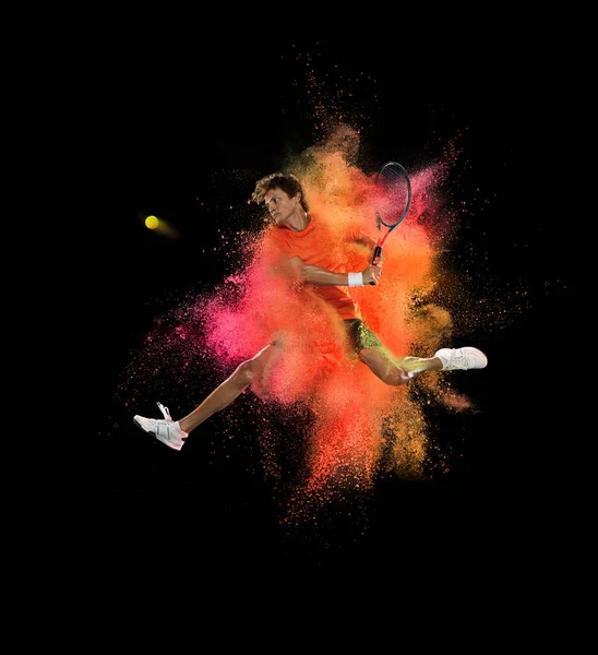 Egy teniszező robbanás színes neon por elszigetelt fekete háttér — Stock Fotó