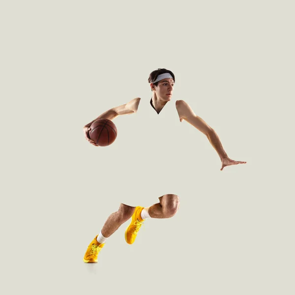 Kortárs művészeti kollázs. Professzionális férfi kosárlabda játékos játszik elszigetelt fény háttér. — Stock Fotó