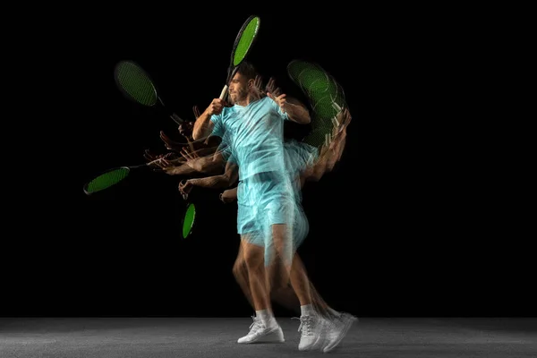 One man, professional tennis player isolated on black background in mixed neon light. Stroboscope — Stock Photo, Image