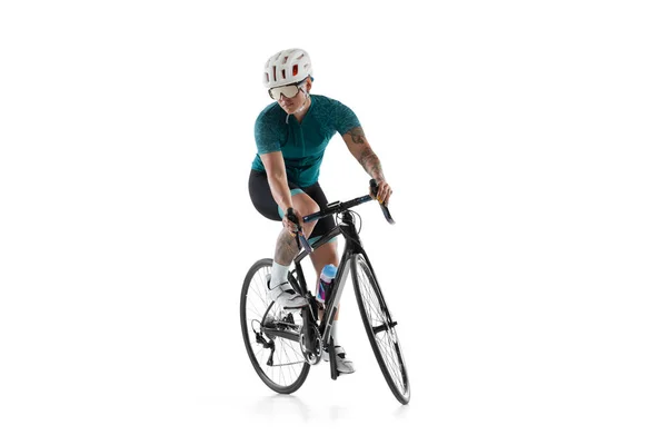 Junge Radprofi-Fahrerin auf Rennrad isoliert vor weißem Hintergrund. — Stockfoto