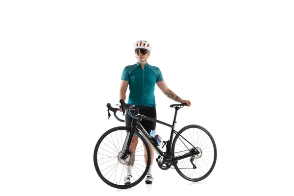 Junge Radprofi-Fahrerin auf Rennrad isoliert vor weißem Hintergrund. — Stockfoto