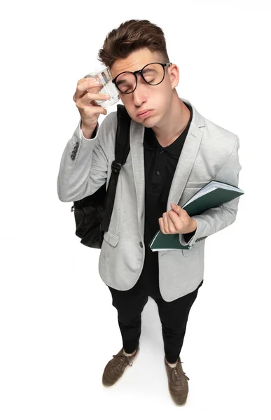 Need to cool down. One young man, student in grey jacket with glass isolated over white studio background. — Stok fotoğraf