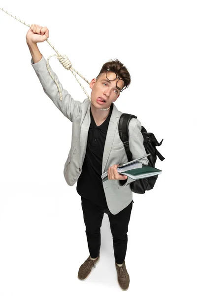 Need some rest. One young man, tired student in grey jacket with noose around neck isolated over white studio background. — Stok fotoğraf