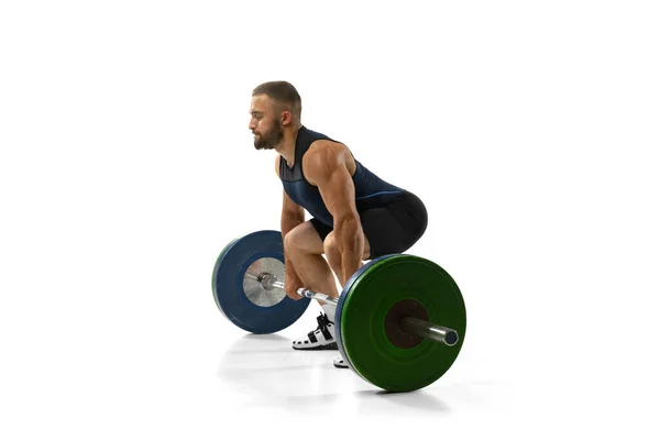 전체 길이 스포츠 흰색 배경에 고립 된 무게와 운동에 있는 남자의 초상화 — 스톡 사진