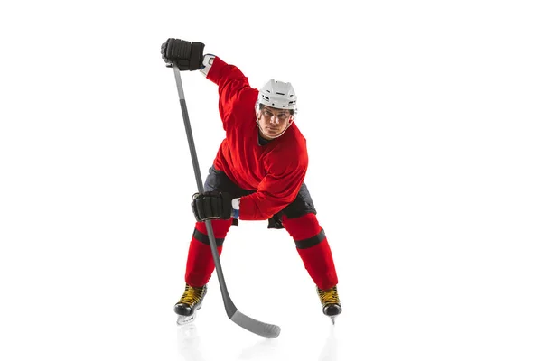 Full-length image of professional male hockey player training isolated over white background — Stock Photo, Image