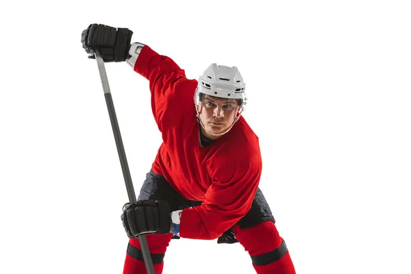 Portrait of professional male hockey player training isolated over white background — Stock Photo, Image