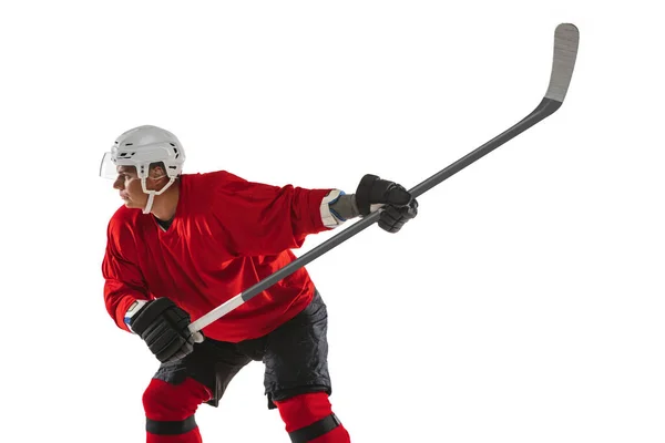 High concentration. Portrait of male hockey player training on white background — Stock Photo, Image