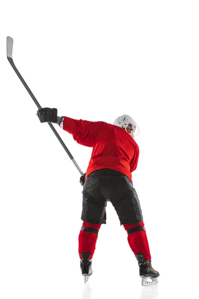 Achteraanzicht portret van man hockey speler training geïsoleerd over witte achtergrond — Stockfoto