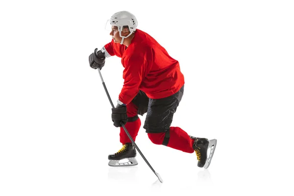 Full-length image of professional male hockey player training isolated over white background — Stock Photo, Image