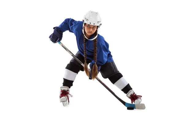 Full-length portrait of child girl, hockey player isolated over black background — Stock Photo, Image