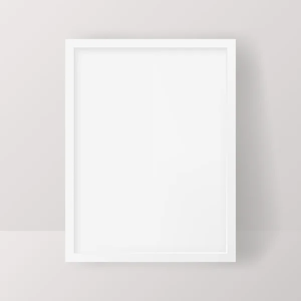 Realistic Empty White Picture Frame isolated on a neutral gray background. — Stock Vector