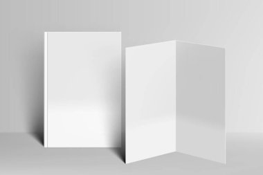 Sert kapaklı ve broşürlü boş bir kitap
