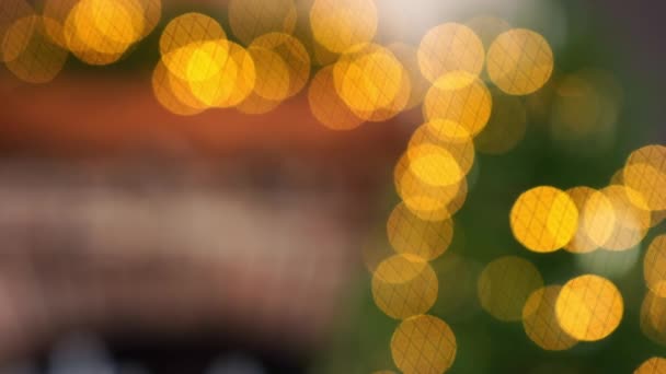 Lampu oranye kuning kabur abstrak dengan bokeh. Lampu Natal — Stok Video