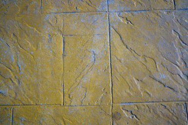 Dikdörtgen taş tuğlalardan bir duvar. kaldırım taşlarının arkaplan ve dokusu. 