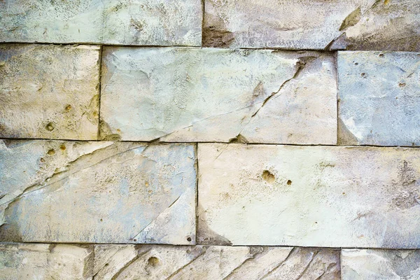 Стіна з прямокутної кам'яної цегли. фон і текстура бруківки . — стокове фото