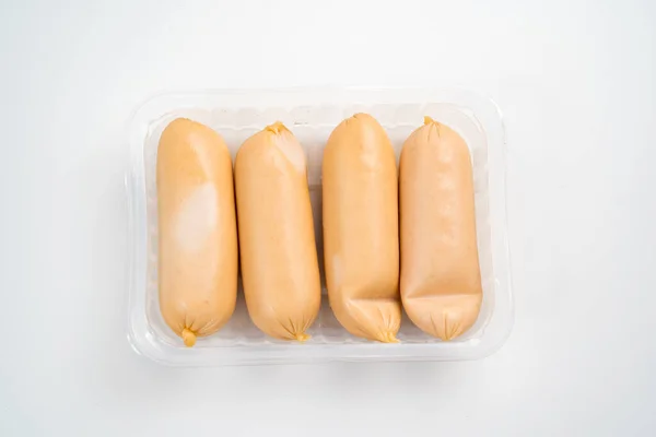 plastic packaging with raw sausages. semi-finished products