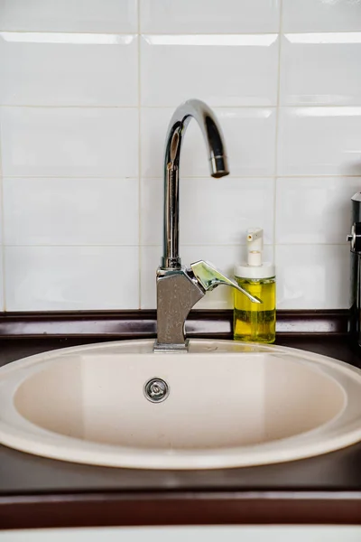 Kitchen sink and hand soap and dishwashing. — Stock Photo, Image