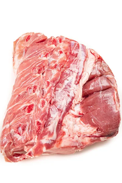 Stück rohes Schweinefleisch auf weißem Hintergrund. isoliert. — Stockfoto