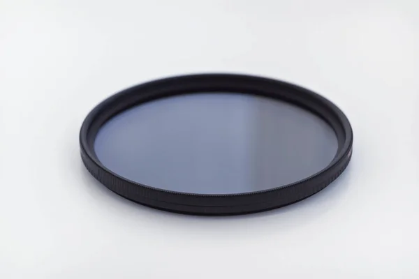 Cpl polarization filter for photo video cameras on white background Royalty Free Stock Photos