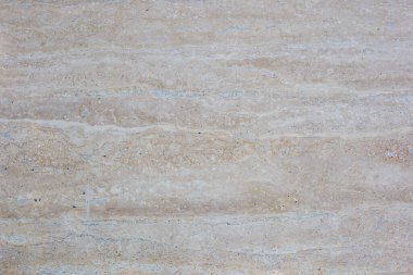 Parlatılmış bej mermer. Gerçek doğal mermer taş dokusu ve yüzey arkaplanı. Açık kahverengi taş, mermer.