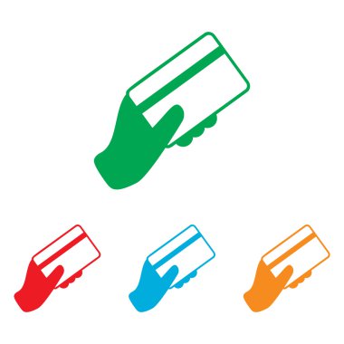 Bir kredi kartı tutuyor.