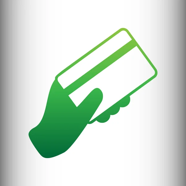 Mão segurando um cartão de crédito — Vetor de Stock