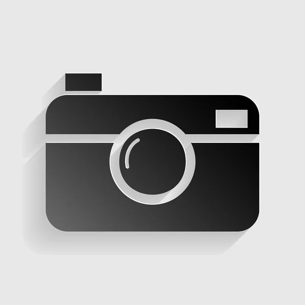 Signo de cámara fotográfica digital. Papel negro con sombra sobre fondo gris . — Archivo Imágenes Vectoriales