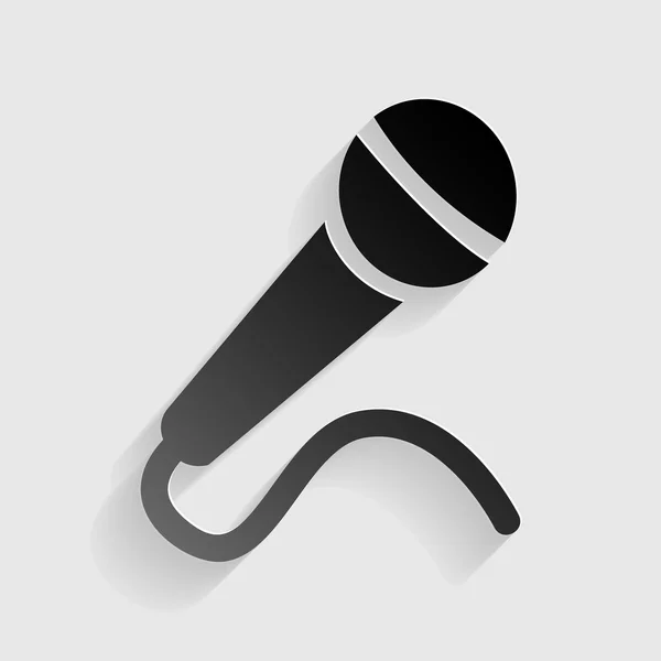 Ilustração do microfone. Papel preto com sombra sobre fundo cinza . — Vetor de Stock