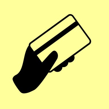 Bir kredi kartı tutuyor.