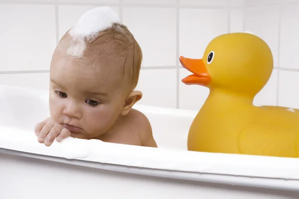 Beautiful baby in a bath tub — Stock Photo, Image