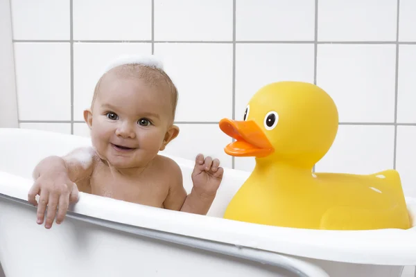 Beautiful baby in a bath tub — Stock Photo, Image