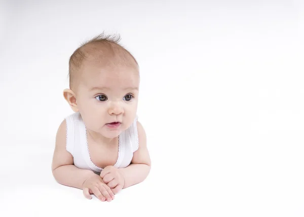 Söt baby på vit bakgrund — Stockfoto