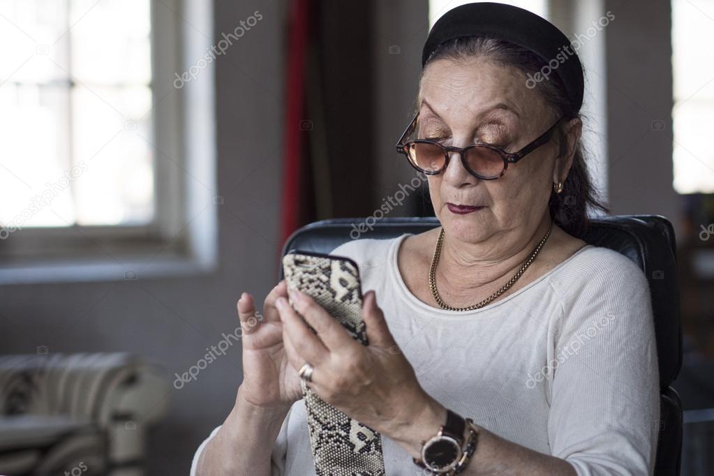 Senior lady using her smart phone