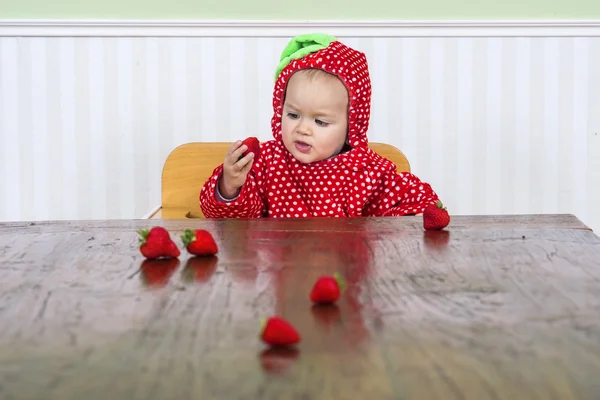 Pretty baby in strawberry suit — Stock Photo, Image