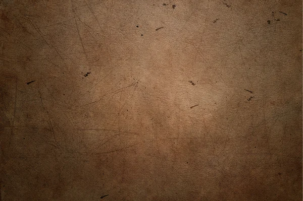 Brown leather background with scratches — Stock Photo, Image