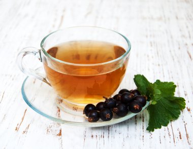 fincan çay ve Siyah frenk üzümü