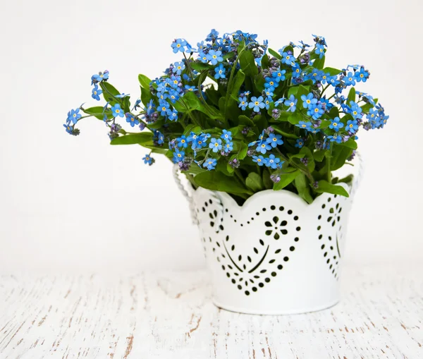 Bouquet of flowers in glass vase — Stock Photo © agneskantaruk 119634874