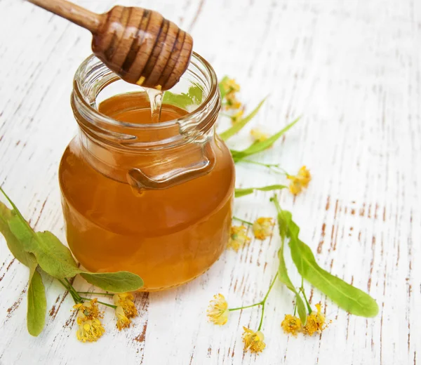 Jar with honey — Stock Photo, Image