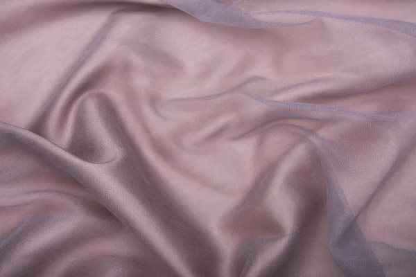 Beautiful Smooth Elegant Wavy Light Brown Satin Silk Luxury Cloth — стоковое фото