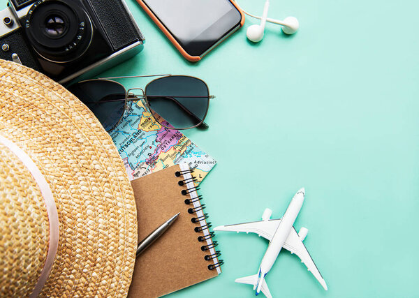 Overhead view of Traveler's accessories. Essential vacation items. Travel concept background. Flat lay