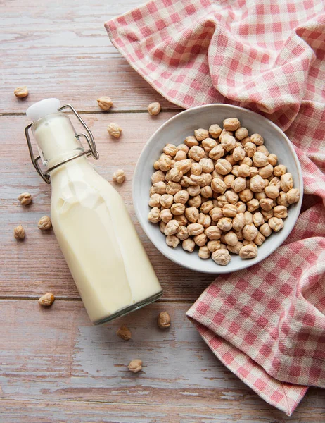 Chick peas milk with chick peas on the table